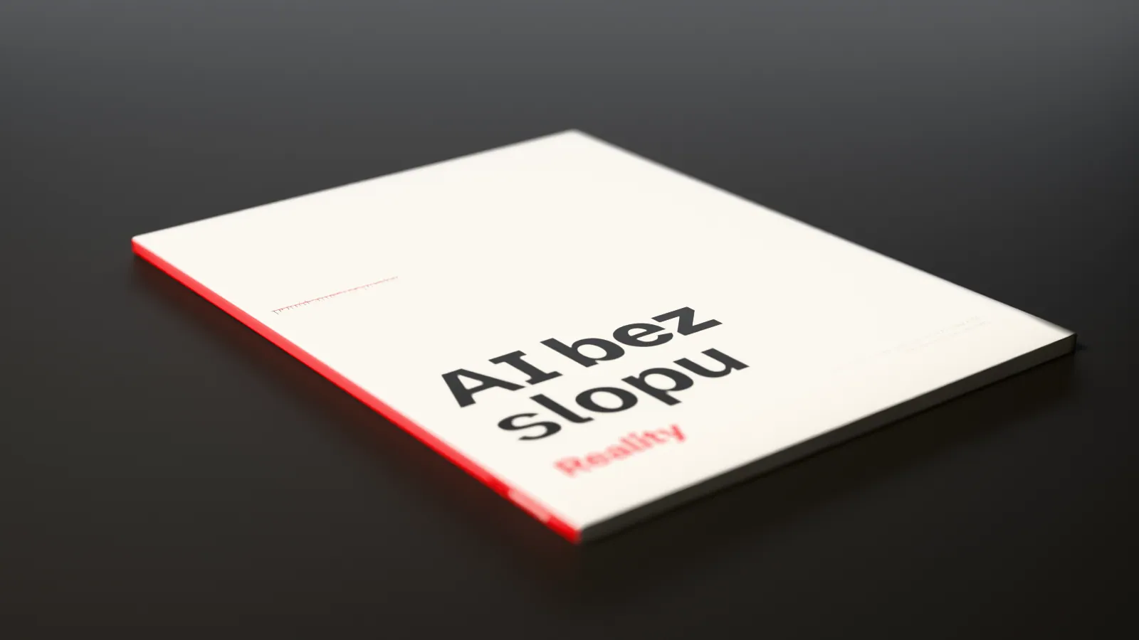 Render of the book AI bez slopu lying closed on a dark table: its white cover with the title in heavy black, “Reality” in red, and a red spine.