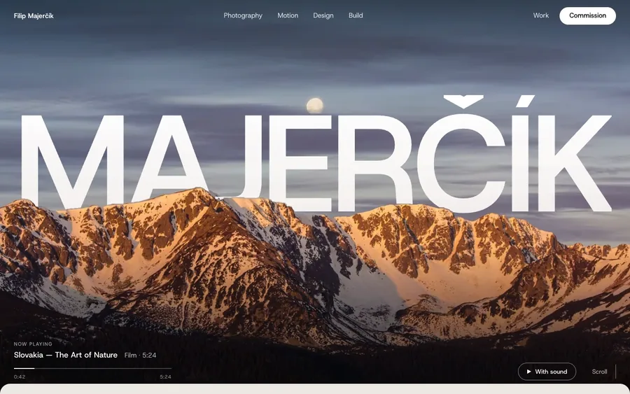 Screenshot. MAJERČÍK website, lab build: the name set over a sunlit ridge in the Low Tatras.